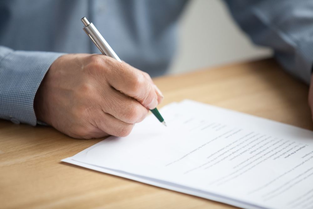 Man Reviewing Contract